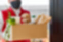 courier-in-protective-mask-and-medical-g